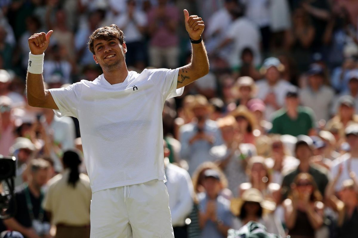 Flavio Cobolli of Italy celebrates after his match against Alex de Minaur of Australia. Cobolli won in three sets at All England Lawn Tennis and Croquet Club on Monday to advance to the quarterfinals.