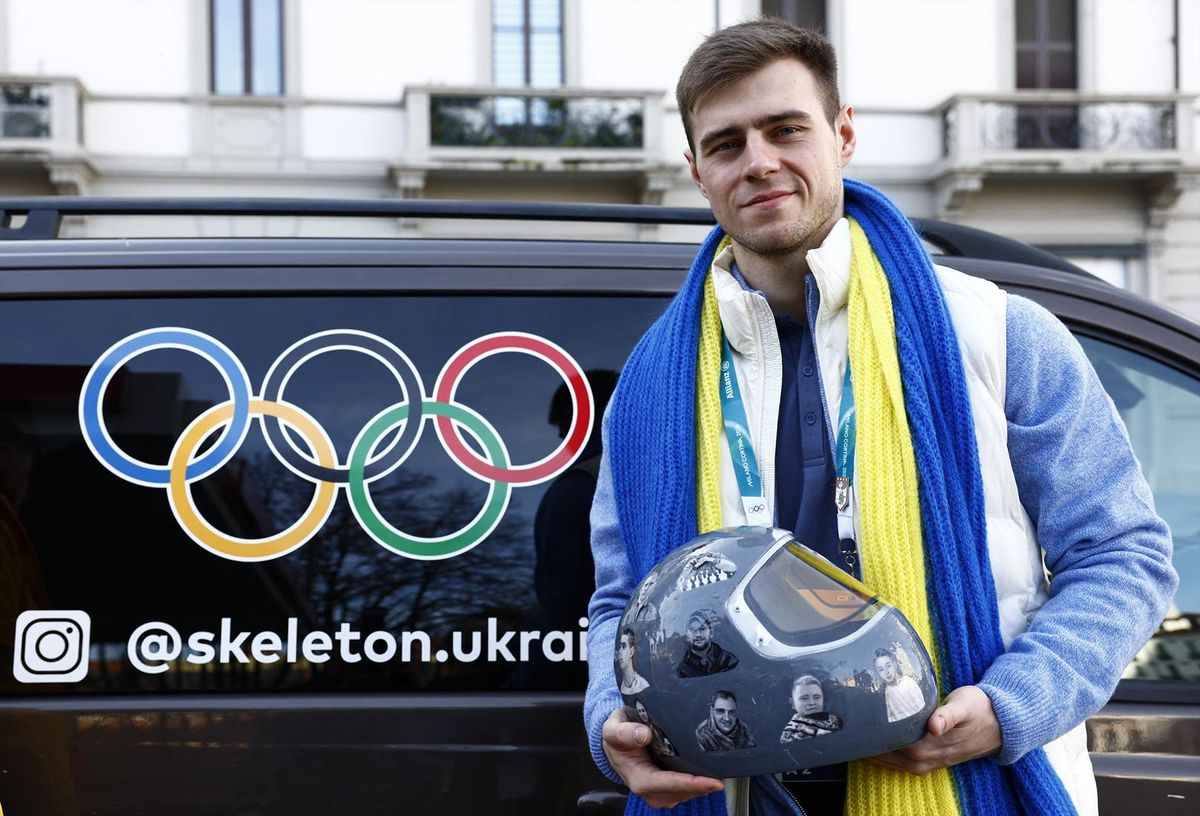 Vladyslav Heraskevych of Ukraine poses with his helmet after appearing before the Court of Arbitration for Sport following his disqualification from the Milan Cortina 2026 Winter Olympics for wearing a helmet in tribute to athletes who have died amid Russia's attack on Ukraine.