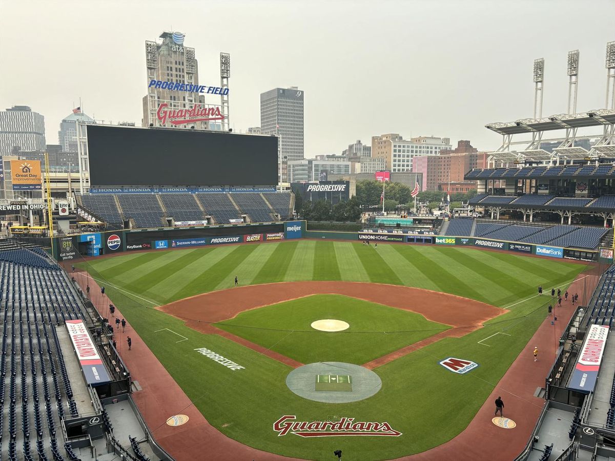 Haze covers the sky at the Cleveland Guardians' Progressive Field as a result of Canadian wildfires on Friday, July 17, 2026. Cleveland's scheduled game against the Pittsburgh Pirates was postponed.