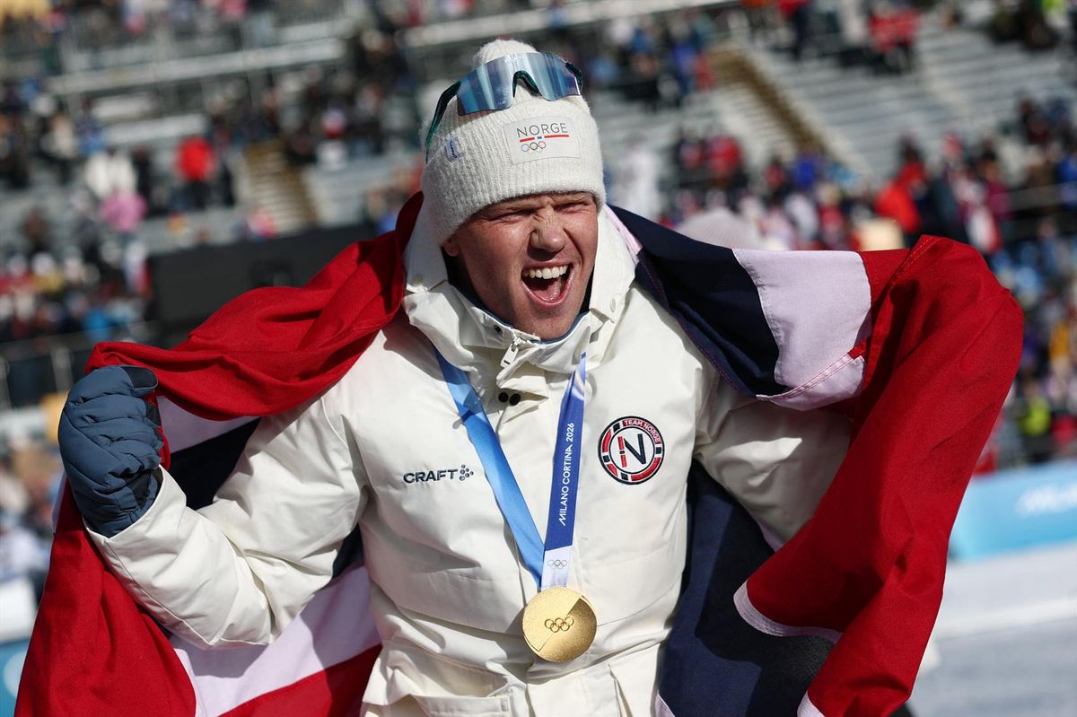 Gold medalist Johannes Dale-Skjevdal of Norway celebrates his win in the men's biathlon 15k mass start. REUTERS/Eloisa Lopez