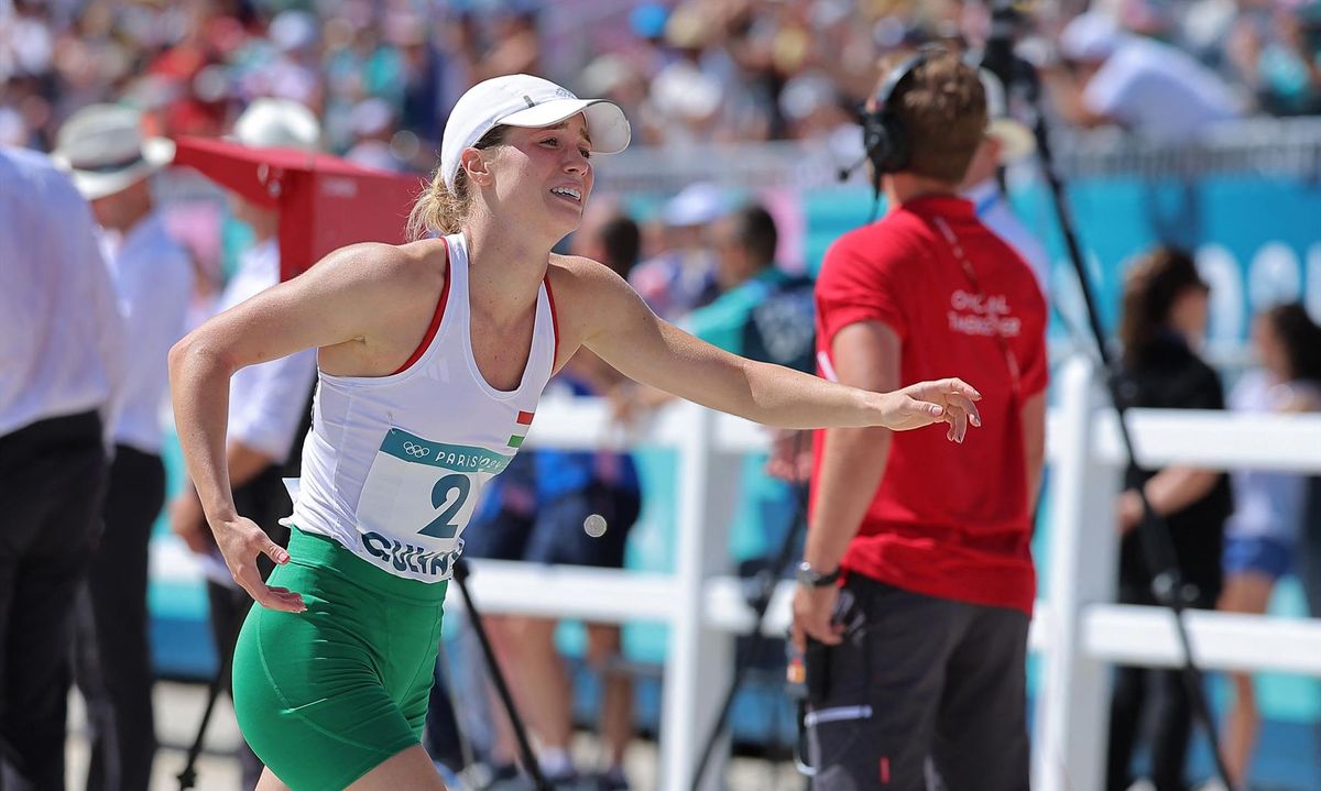 Paris 2024 Olympics - Modern Pentathlon - Women's Final Laser Run - Chateau de Versailles, Versailles, France - August 11, 2024. Michelle Gulyas of Hungary reacts after finishing the race and winning the Gold Medal.