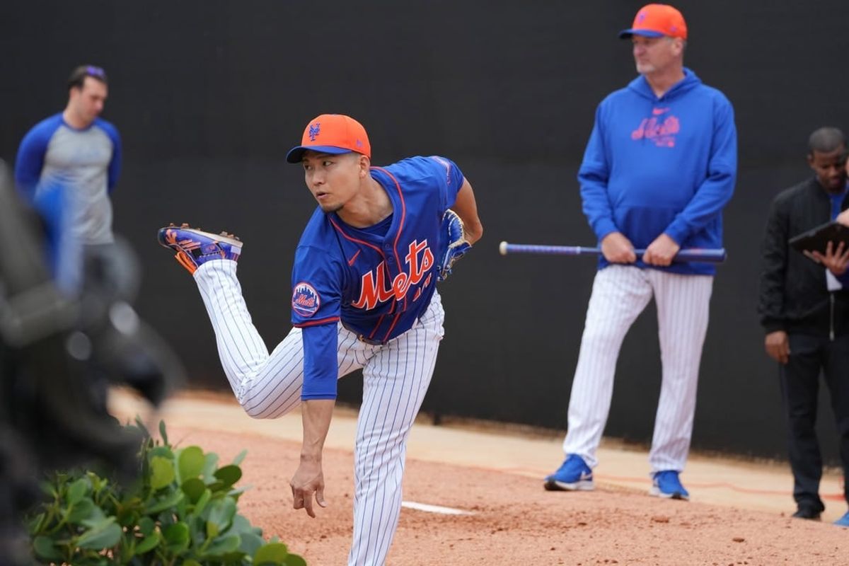 Feb 19, 2024; Port St. Lucie, FL, USA; New York Mets starting pitcher Kodai Senga (34) warms-up during workouts at spring training.