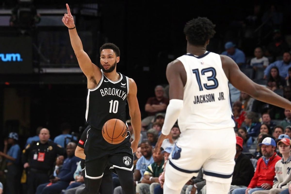 Feb 26, 2024; Memphis, Tennessee, USA; Brooklyn Nets guard Ben Simmons (10) gives direction as he brings the ball up the court during the second half against the Memphis Grizzlies at FedExForum.