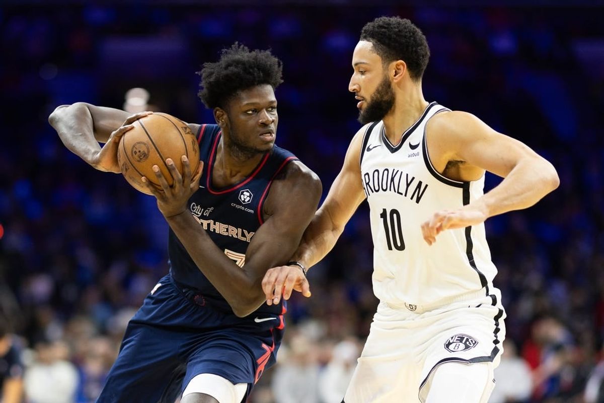 Feb 3, 2024; Philadelphia, Pennsylvania, USA; Philadelphia 76ers center Mo Bamba (7) controls the ball against Brooklyn Nets guard Ben Simmons (10) during the second quarter at Wells Fargo Center.
