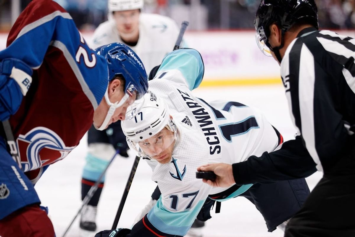 Nov 9, 2023; Denver, Colorado, USA; Seattle Kraken center Jaden Schwartz (17) waits for the puck to drop against Colorado Avalanche center Fredrik Olofsson (22) in the third period at Ball Arena.
