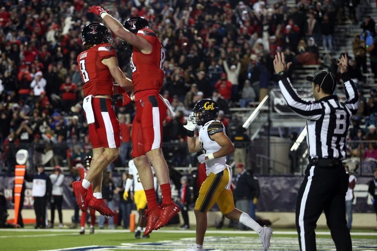 Dec 16, 2023; Shreveport, LA, USA; Texas Tech Red Raiders wide receiver Coy Eakin (8) reacts with tight end Mason Tharp (80) after a touchdown catch during the first half against the California Golden Bears at Independence Stadium.