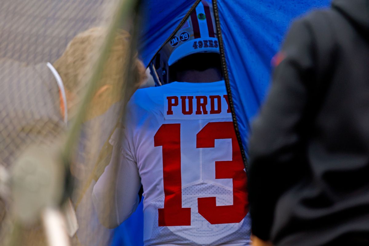 Brock Purdy walks into the medical tent after suffering an injury during the 1st quarter of the NFC Championship game against the Philadelphia Eagles at Lincoln Financial Field on Jan. 29, 2023, in Philadelphia.