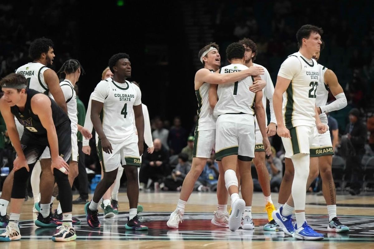 Dec 2, 2023; Las Vegas, Nevada, USA; Colorado State Rams guard Isaiah Stevens (4), forward Joel Scott (1) and guard Cam Lowe (22) celebrate after the Legends of Basketball Las Vegas Invitational game against the Washington Huskies at MGM Grand Garden Arena.