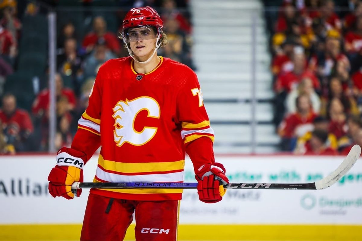 Feb 22, 2024; Calgary, Alberta, CAN; Calgary Flames center Martin Pospisil (76) against the Boston Bruins during the second period at Scotiabank Saddledome.