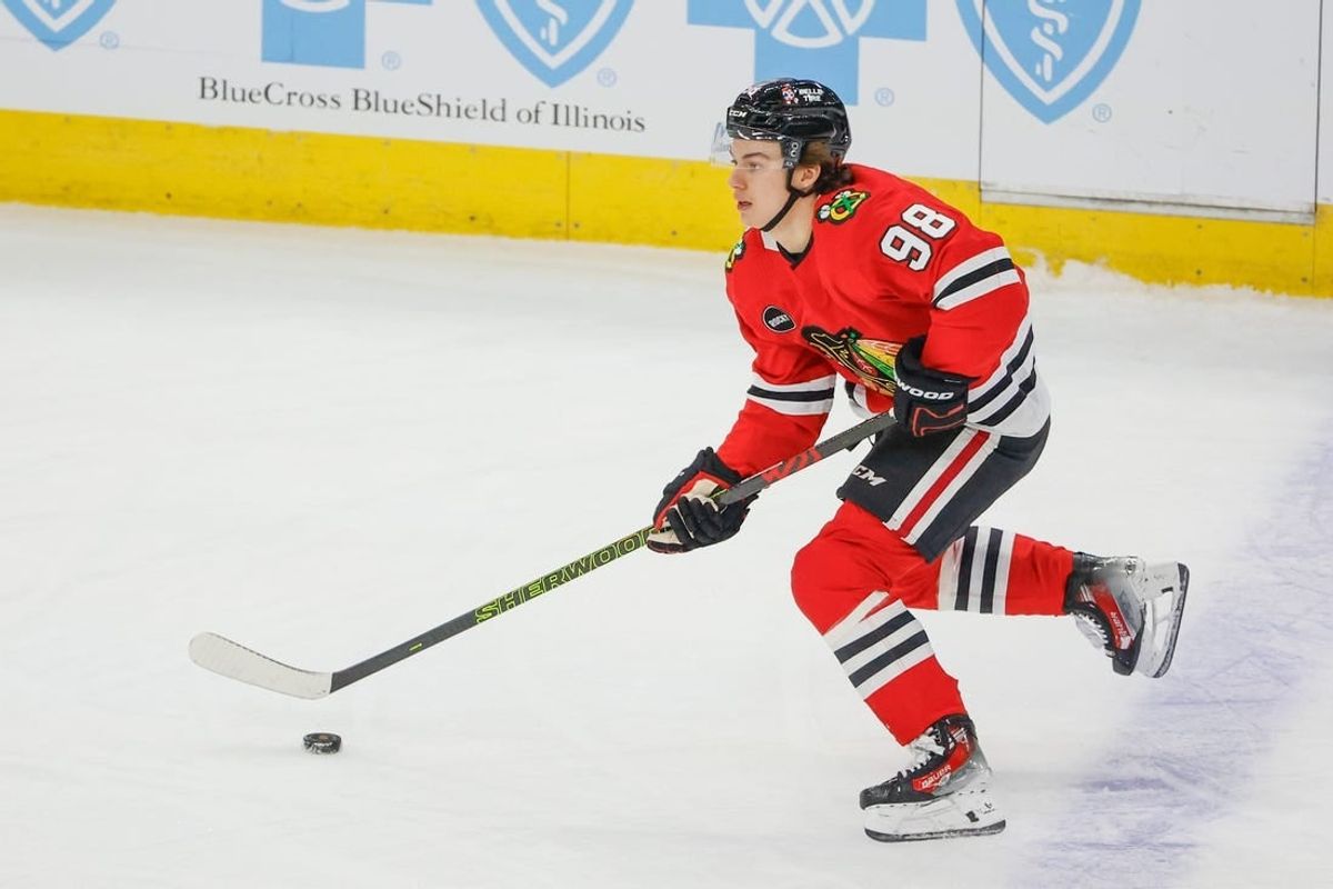 Nov 26, 2023; Chicago, Illinois, USA; Chicago Blackhawks center Connor Bedard (98) controls the puck against the St. Louis Blues during the first period at United Center.