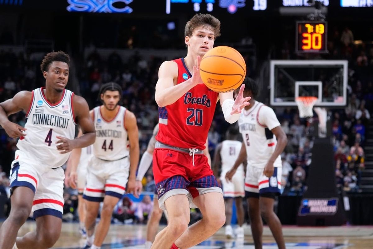 Mar 19, 2023; Albany, NY, USA; Saint Mary's Gaels guard Aidan Mahaney (20) receives a pass against the Connecticut Huskies during the first half at MVP Arena.