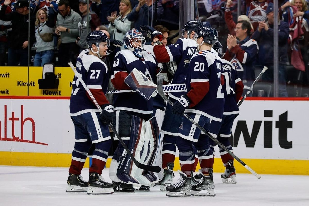 Mar 8, 2024; Denver, Colorado, USA; Colorado Avalanche goaltender Alexandar Georgiev (40) and right wing Valeri Nichushkin (13) and left wing Jonathan Drouin (27) and center Ross Colton (20) celebrate after the game against the Minnesota Wild at Ball Arena.