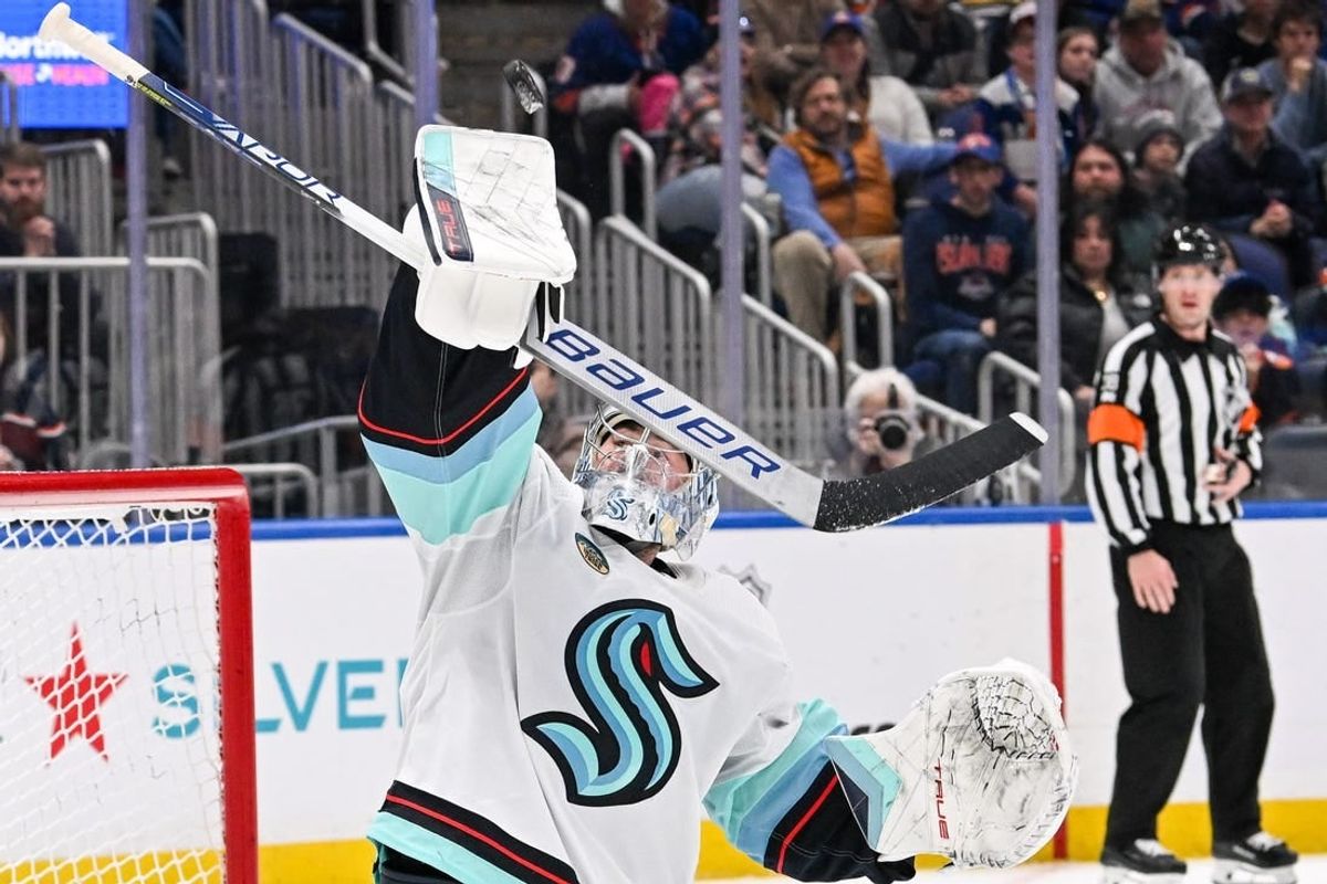 Feb 13, 2024; Elmont, New York, USA; Seattle Kraken goaltender Philipp Grubauer (31) makes a blocker save against the New York Islanders during the second period at UBS Arena.
