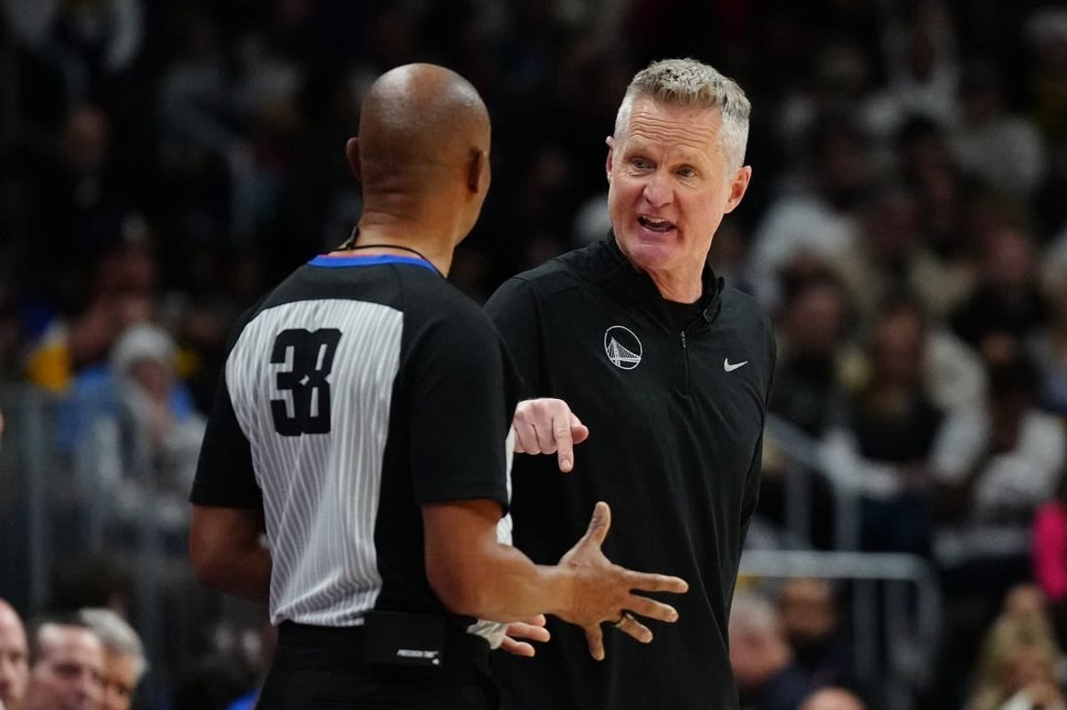 Dec 25, 2023; Denver, Colorado, USA; Golden State Warriors head coach Steve Kerr talks to referee Michael Smith (38) in the second half against the Denver Nuggets at Ball Arena.