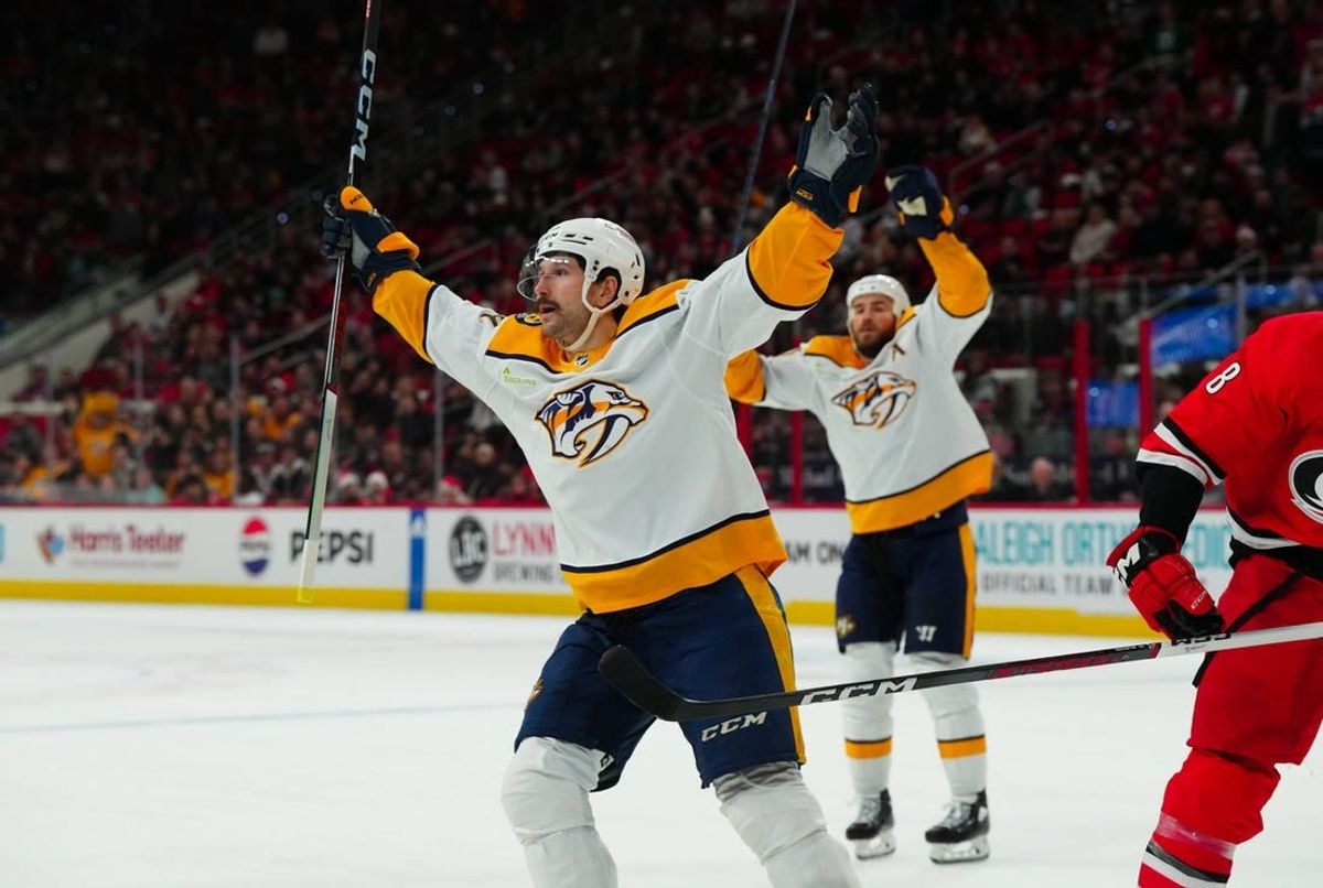 Dec 15, 2023; Raleigh, North Carolina, USA;  Nashville Predators left wing Filip Forsberg (9) celebrates his game winning goal in the overtime against the Carolina Hurricanes at PNC Arena.