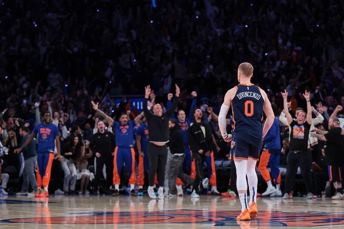 Apr 22, 2024; New York, New York, USA;  New York Knicks guard Donte DiVincenzo (0) reacts after making a three point basket during the fourth quarter during game two of the first round for the 2024 NBA playoffs against the Philadelphia 76ers at Madison Square Garden.