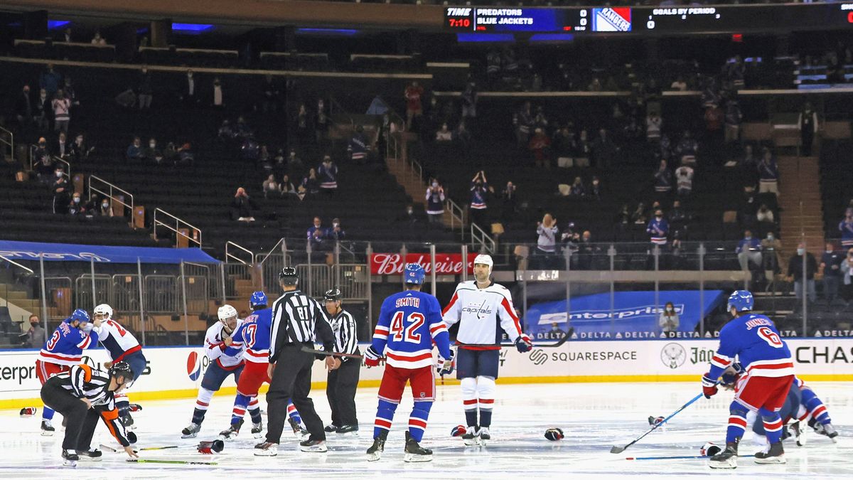 The ma ndatory goo nery i n the Ra ngers-Capitals game was celebrated in hockey circles. But why?