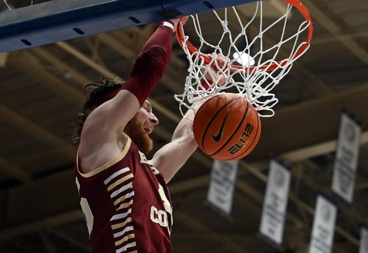 Feb 10, 2024; Durham, North Carolina, USA; Boston College Eagles guard Mason Madsen (45) dunks against the Duke Blue Devils during the first half at Cameron Indoor Stadium.
