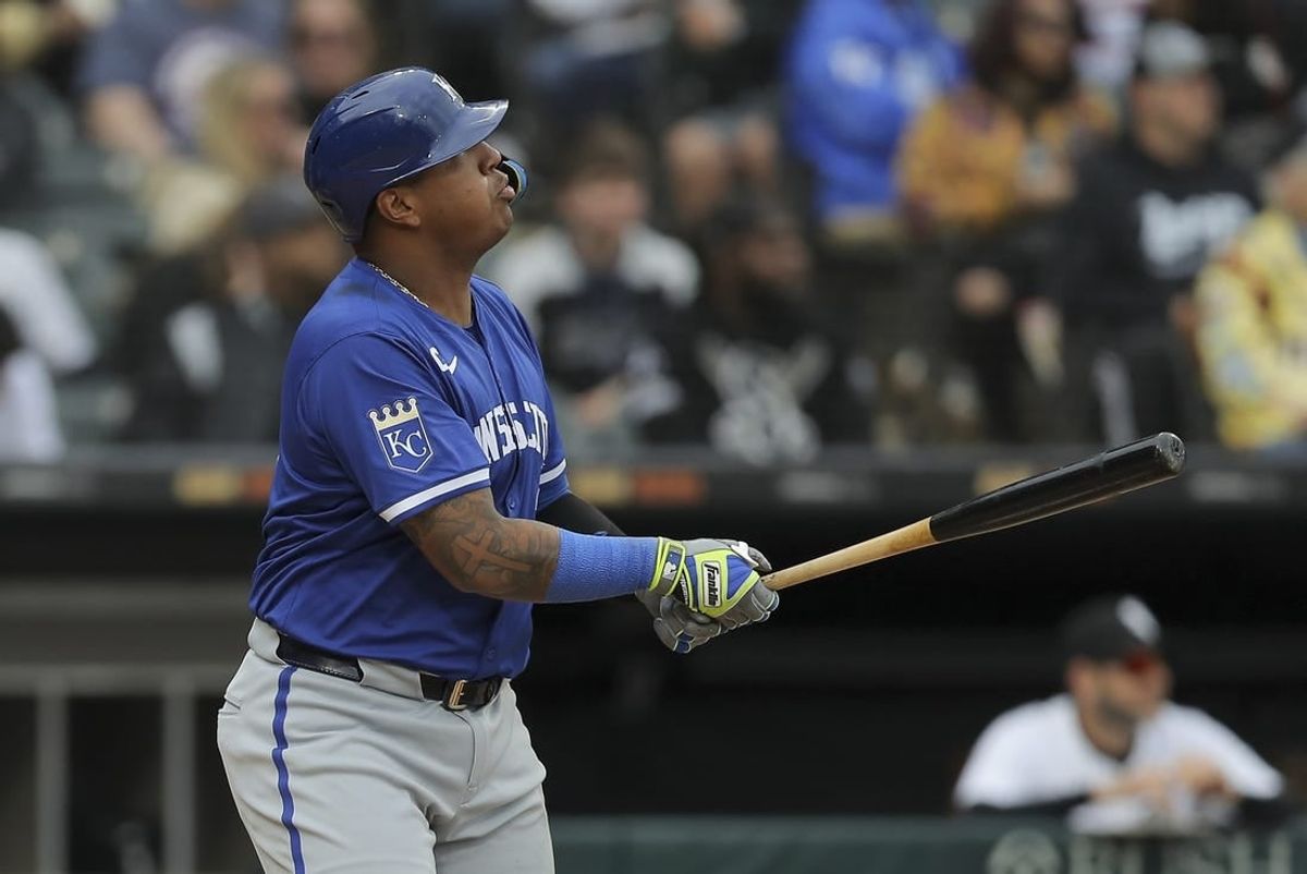 Apr 17, 2024; Chicago, Illinois, USA; Kansas City Royals catcher Salvador Perez (13) watches the ball after hitting a two-run home run in the eight inning during game one of a double header against the Chicago White Sox at Guaranteed Rate Field.