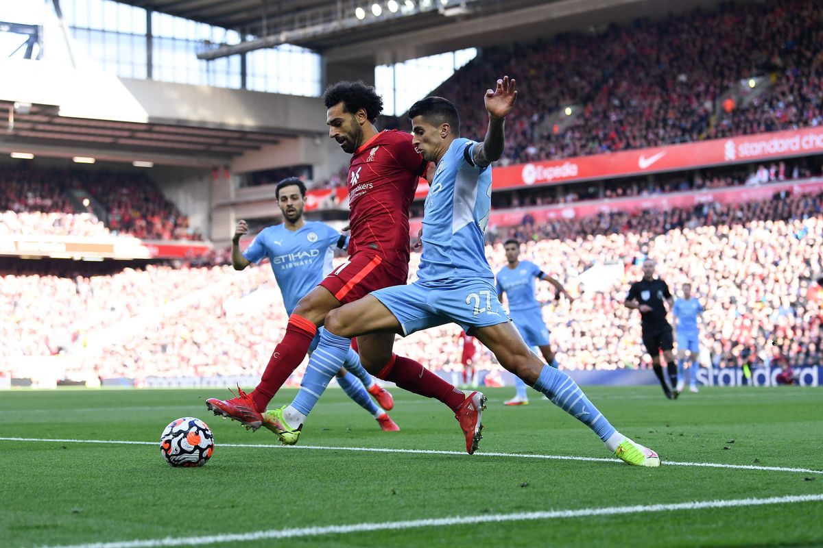 Mo Salah blows past João Cancelo en route to scoring at will.