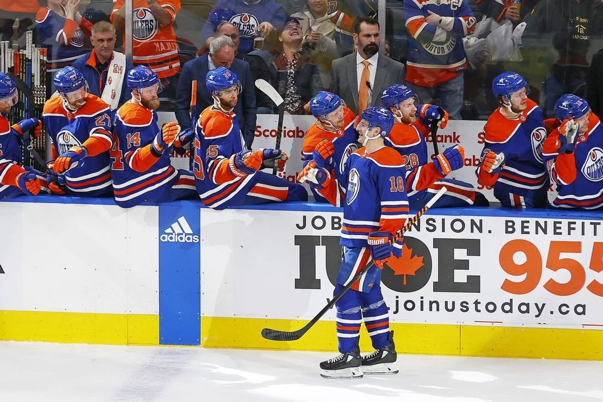 Jan 6, 2024; Edmonton, Alberta, CAN; Edmonton Oilers forward Zach Hyman (18) celebrates with teammates after scoring his  third goal of the game against the Ottawa Senators during the third period at Rogers Place.