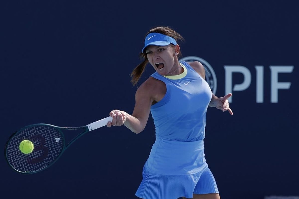 Mar 19, 2024; Miami Gardens, FL, USA; Simona Halep (ROU) hits a forehand against Paula Badosa (ESP) (not pictured) on day two of the Miami Open at Hard Rock Stadium.