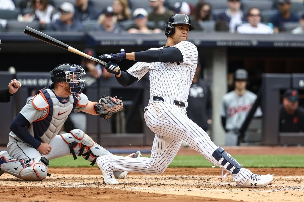 May 4, 2024; Bronx, New York, USA;  New York Yankees right fielder Juan Soto (22) hits a single in the third inning against the Detroit Tigers at Yankee Stadium.