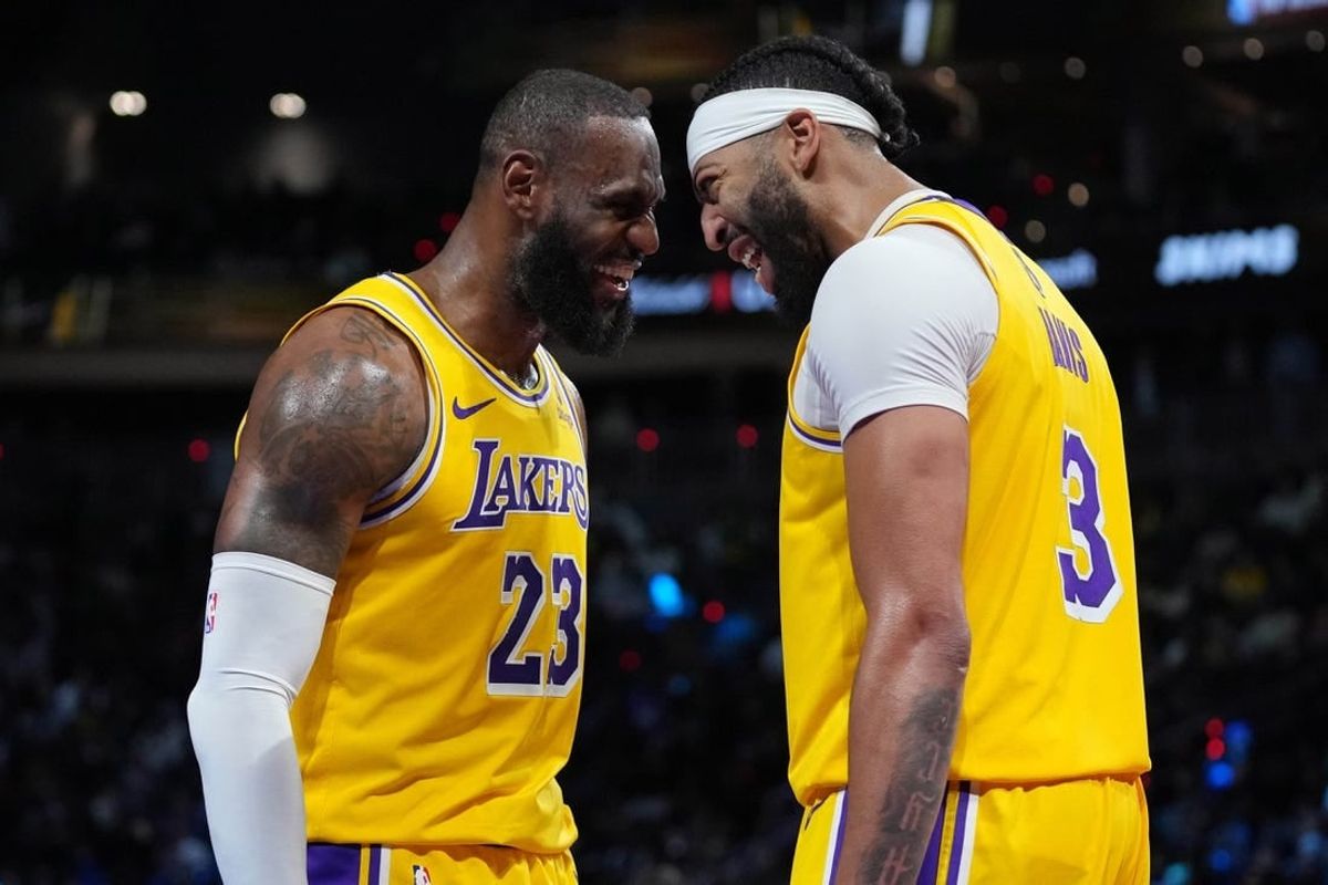 Dec 9, 2023; Las Vegas, Nevada, USA; Los Angeles Lakers forward LeBron James (23) and forward Anthony Davis (3) celebrate after winning the in season tournament championship final against the Indiana Pacers at T-Mobile Arena.