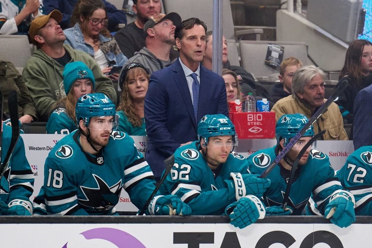 Dec 12, 2023; San Jose, California, USA; San Jose Sharks head coach David Quinn watches the game from the bench against the Winnipeg Jets during the first period at SAP Center at San Jose.