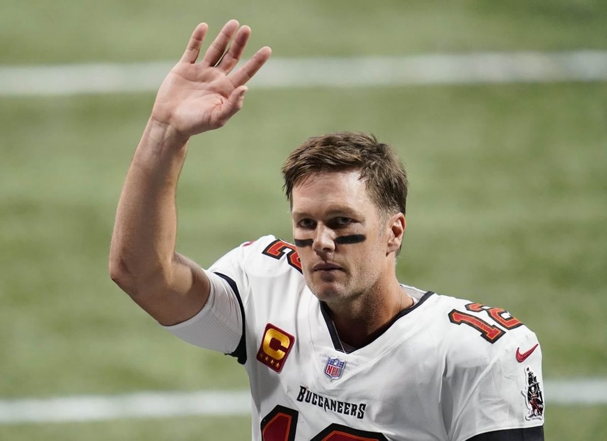 Dec 20, 2020; Atlanta, Georgia, USA;  Tampa Bay Buccaneers quarterback Tom Brady (12) waves after defeating the Atlanta Falcons in a NFL game at Mercedes-Benz Stadium.