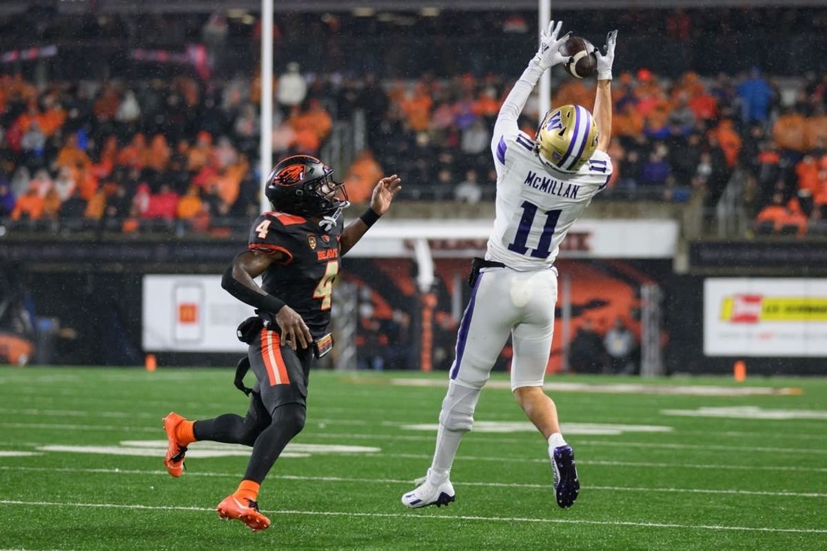 Nov 18, 2023; Corvallis, Oregon, USA; Washington Huskies wide receiver Jalen McMillan (11) goes up for a pass during the second half against the Oregon State Beavers at Reser Stadium.