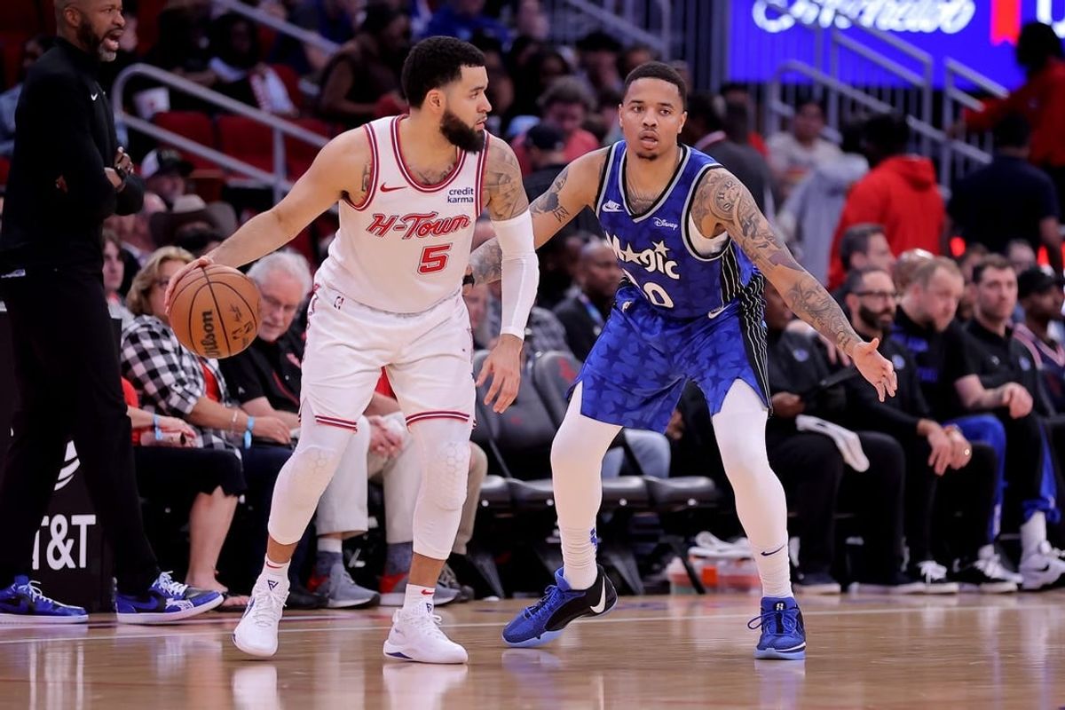 Apr 9, 2024; Houston, Texas, USA; Houston Rockets guard Fred VanVleet (5) handles the ball against Orlando Magic guard Markelle Fultz (20) during the third quarter at Toyota Center.