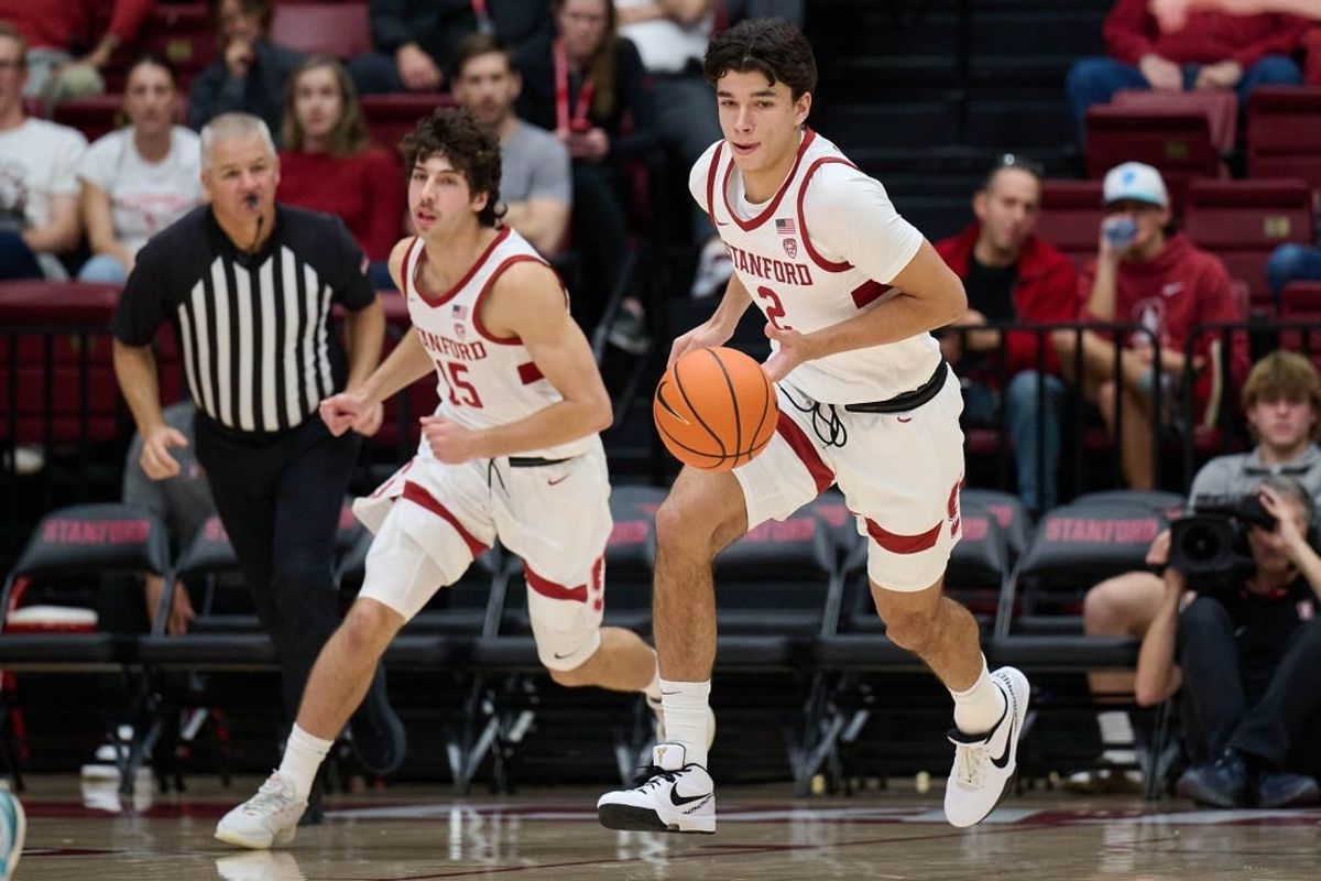 Dec 3, 2023; Stanford, California, USA; Stanford Cardinal guard Andrej Stojakovic (2) brings the ball up court with guard Benny Gealer (15) against the San Diego Toreros during the first half at Maples Pavilion.
