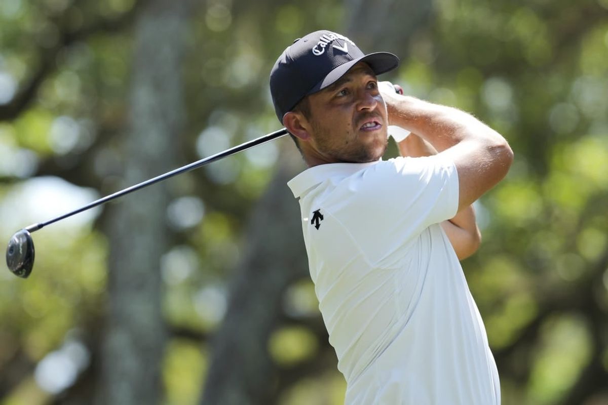 Apr 19, 2024; Hilton Head, South Carolina, USA; Xander Schauffele plays his shot from the 16th tee during the second round of the RBC Heritage golf tournament.