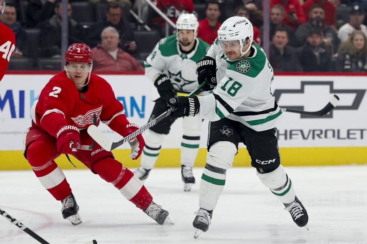 Jan 23, 2024; Detroit, Michigan, USA;  Dallas Stars center Sam Steel (18) takes a shot against the Detroit Red Wings at Little Caesars Arena.