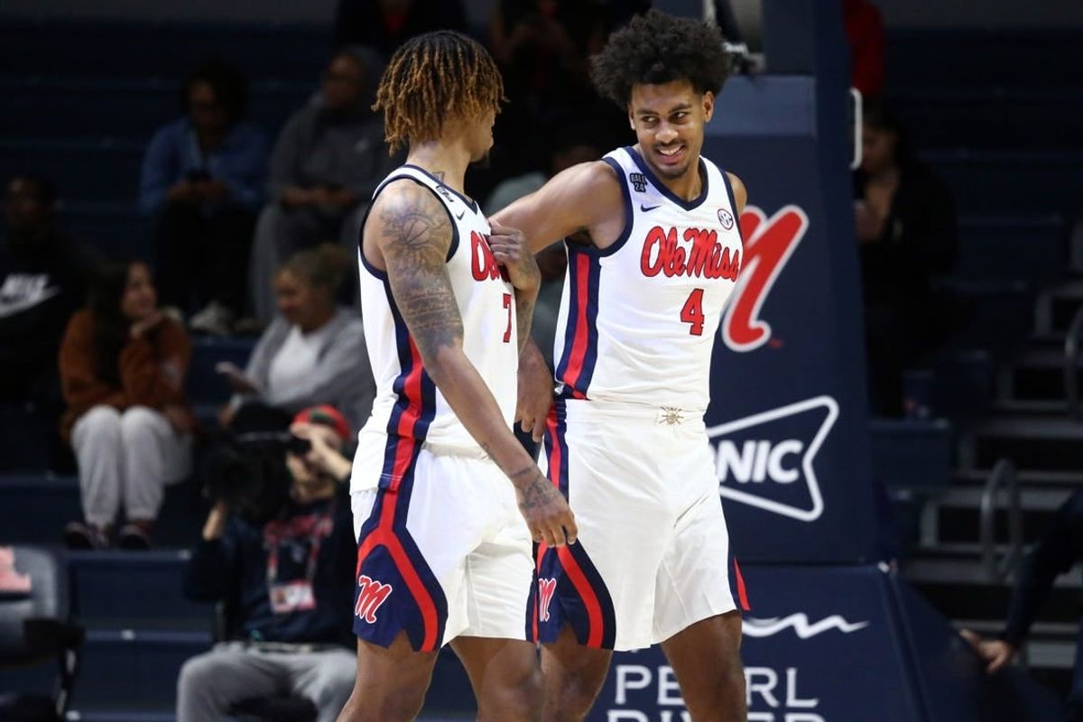 Dec 5, 2023; Oxford, Mississippi, USA; Mississippi Rebels forward Jaemyn Brakefield (4) and Mississippi Rebels guard Allen Flanigan (7) talk during the second half against the Mount St. Mary's Mountaineers at The Sandy and John Black Pavilion at Ole Miss.