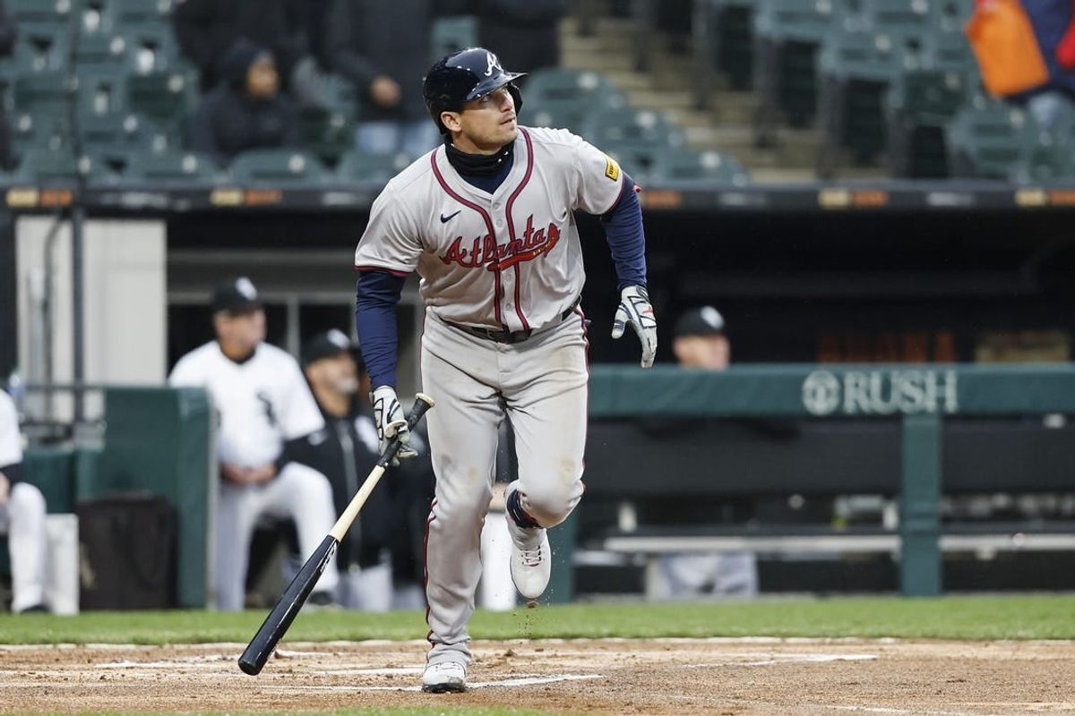 Apr 1, 2024; Chicago, Illinois, USA; Atlanta Braves third baseman Austin Riley (27) watches his three-run home run against the Chicago White Sox during the eight inning at Guaranteed Rate Field.