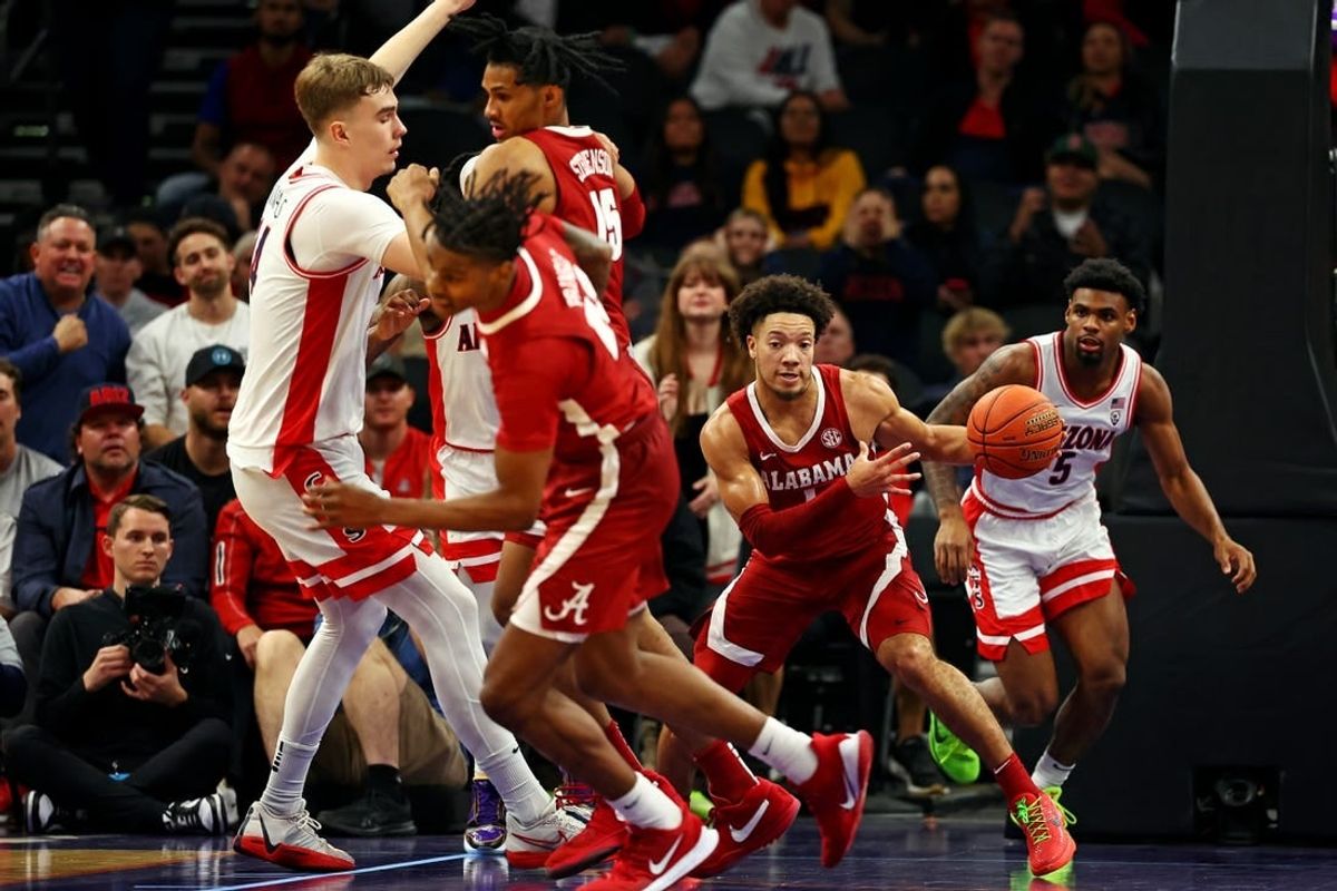 Dec 20, 2023; Phoenix, Arizona, USA; Alabama Crimson Tide guard Mark Sears (1) brings the ball up court during the first half of the game against the Arizona Wildcats in the Hall of Fame Series at Footprint Center.