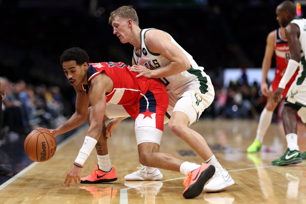 Jordan Poole (l.) has been a huge bust in DC.