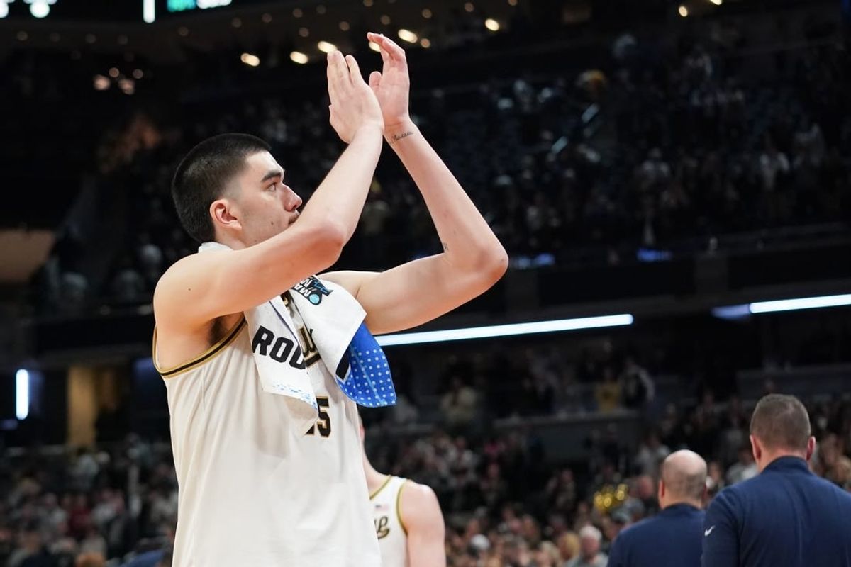 Mar 24, 2024; Indianapolis, IN, USA; Purdue Boilermakers center Zach Edey (15) thanks the fans after a victory against the Utah State Aggies at Gainbridge FieldHouse.
