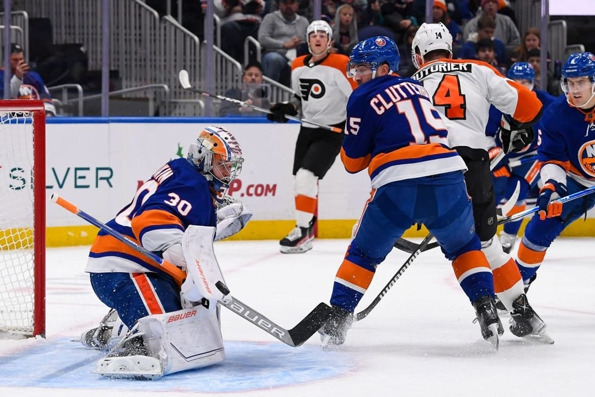 Nov 22, 2023; Elmont, New York, USA; New York Islanders goaltender Ilya Sorokin (30) makes a save against the Philadelphia Flyers during the first period at UBS Arena.