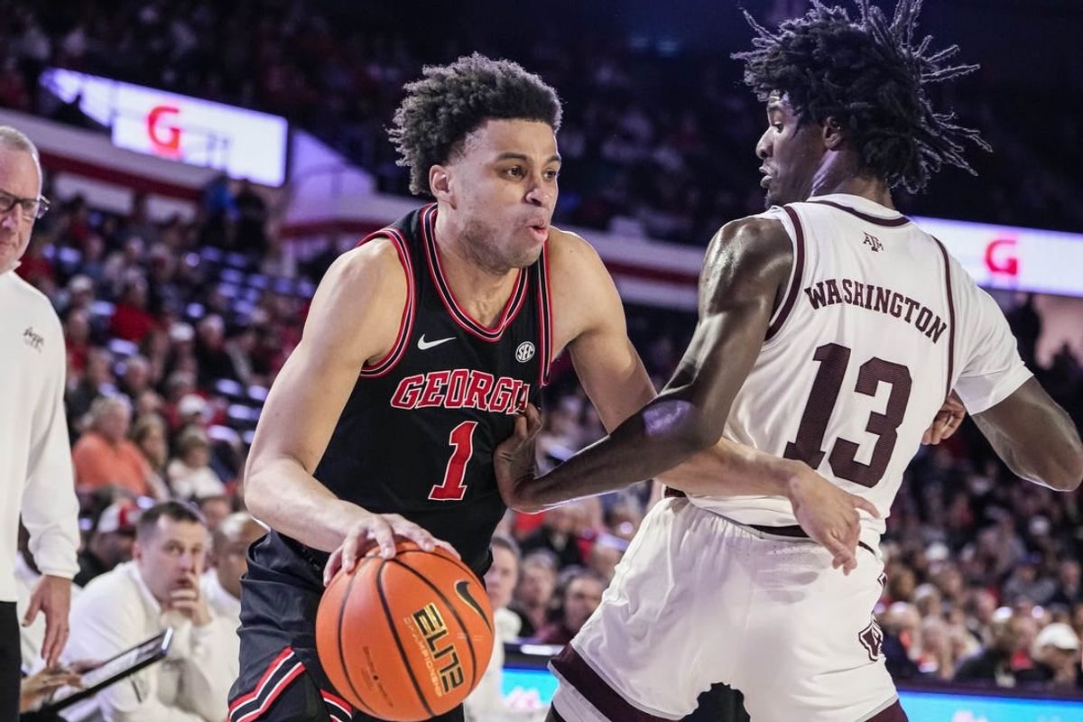 Mar 2, 2024; Athens, Georgia, USA; Georgia Bulldogs guard Jabri Abdur-Rahim (1) dribbles against Texas A&M Aggies forward Solomon Washington (13) during the first half at Stegeman Coliseum.