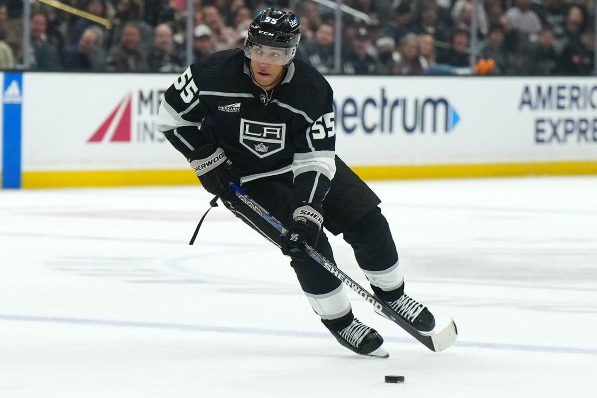 Jan 18, 2024; Los Angeles, California, USA; LA Kings right wing Quinton Byfield (55) skates with the puck against the Nashville Predators in the second period at Crypto.com Arena.