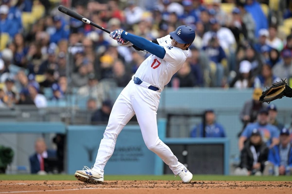 Apr 14, 2024; Los Angeles, California, USA; Los Angeles Dodgers designated hitter Shohei Ohtani (17) at bat in the third inning against the San Diego Padres at Dodger Stadium.