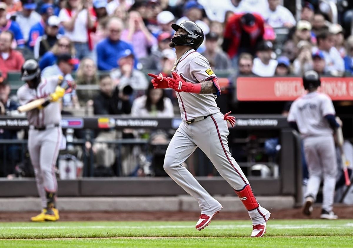May 11, 2024; New York City, New York, USA; Atlanta Braves shortstop Orlando Arcia (11) rounds the bases after hitting a two run home run against the New York Mets during the third inning at Citi Field.
