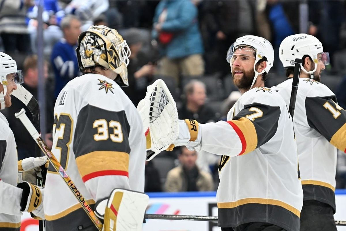 Feb 27, 2024; Toronto, Ontario, CAN;  Vegas Golden Knights defenseman Alex Pietrangelo (7) bumps gloves with goalie Adin Hill (33) as they celebrate a win over the Toronto Maple Leafs at Scotiabank Arena.