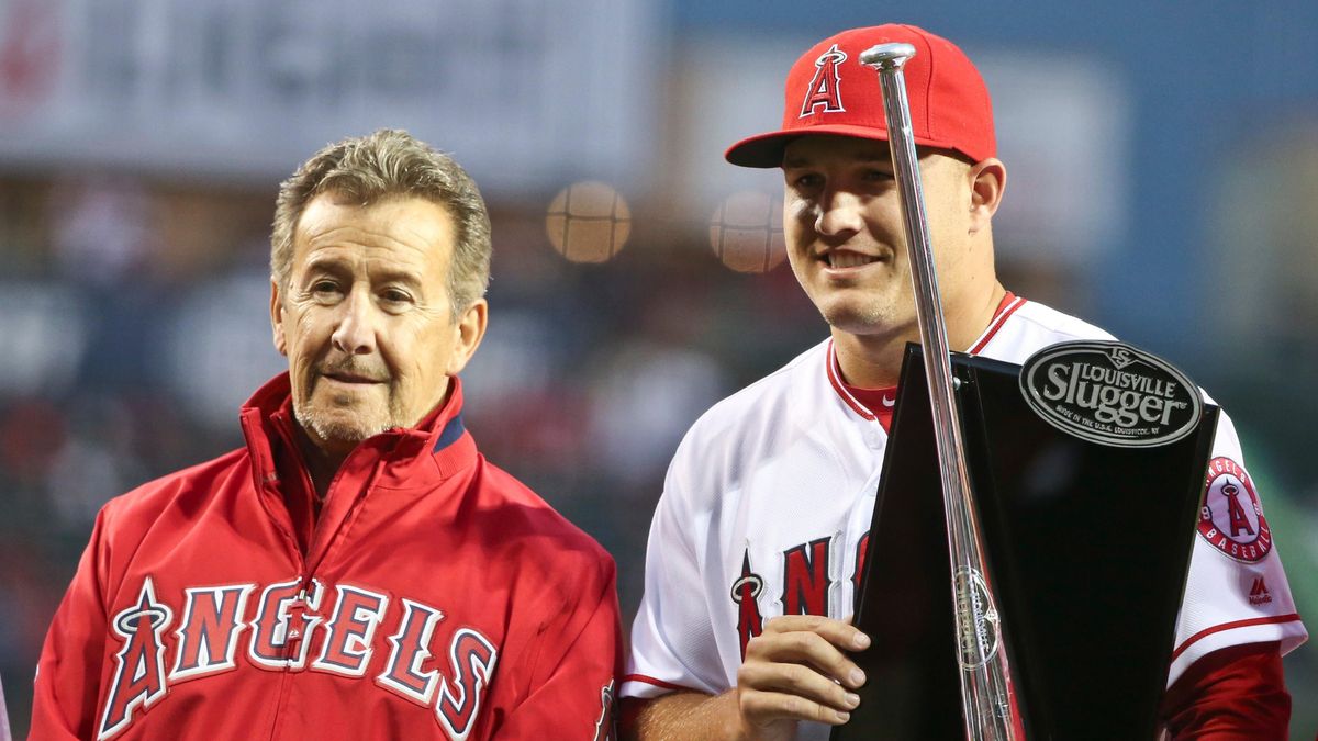 Los Angeles Angels owner Arte Moreno, left, stands with outfielder Mike Trout after presenting Trout with a Silver Slugger Award prior to a baseball game against the Texas Rangers, Friday, April 8, 2016, in Anaheim, Calif.