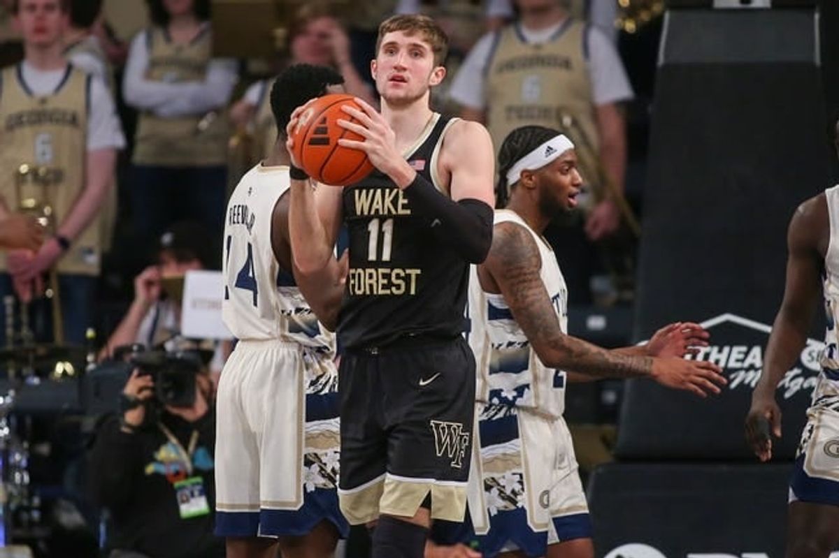 Feb 6, 2024; Atlanta, Georgia, USA; Wake Forest Demon Deacons forward Andrew Carr (11) grabs the ball against the Georgia Tech Yellow Jackets in the second half at McCamish Pavilion.