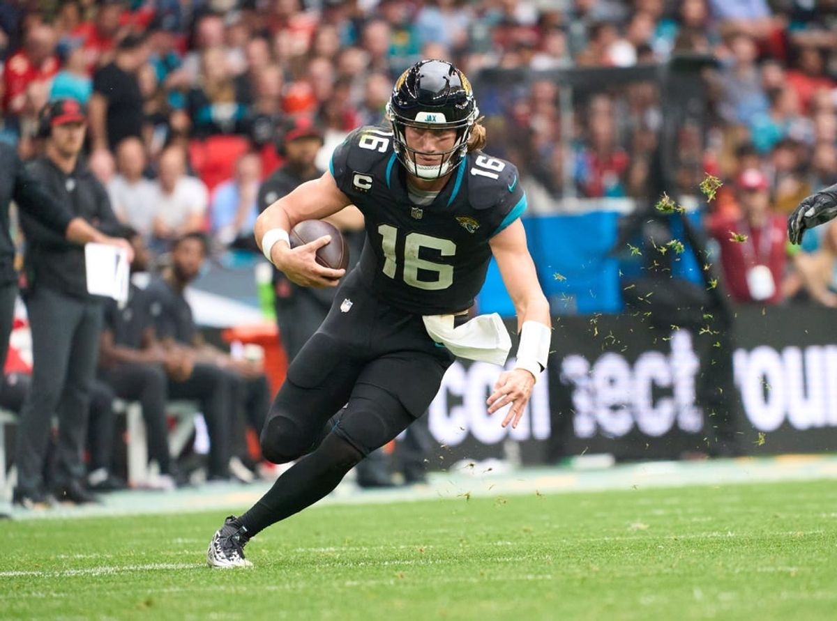 Oct 1, 2023; London, United Kingdom; Jacksonville Jaguars quarterback Trevor Lawrence (16) carries the ball during the second half of an NFL International Series game at Wembley Stadium.