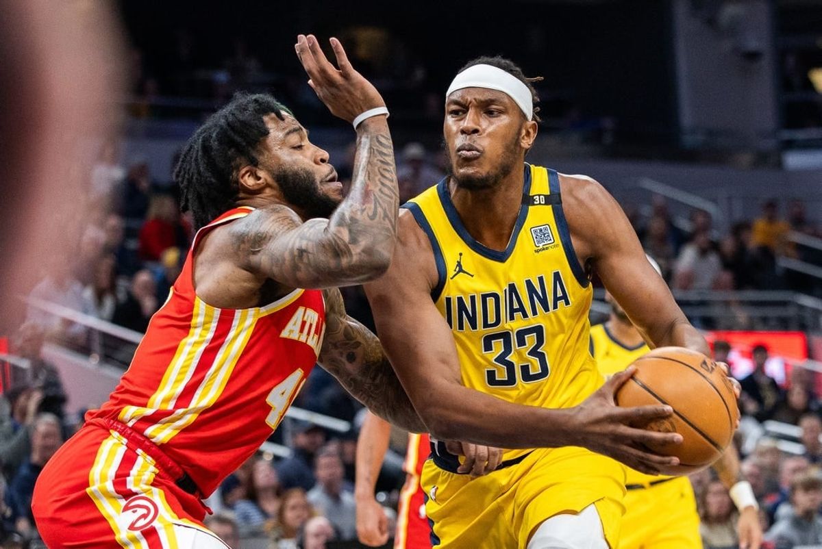 Jan 5, 2024; Indianapolis, Indiana, USA; Indiana Pacers center Myles Turner (33) drives to the basket while Atlanta Hawks forward Saddiq Bey (41) defends in the first quarter at Gainbridge Fieldhouse.